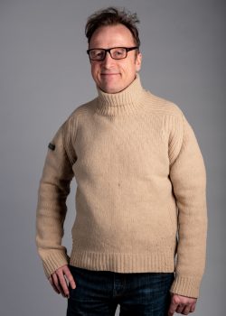 Fabrice (50) has lived on the estate in Morland House since 1998. He works as a picture framer on Kensal Road and is a hobby gardener with an allotment on St Quintin's Avenue.
His jumper is very special to him and is a hand-me down from his big brother. He has carefully removed almost all of the bobbly bits that have appeared over the years.